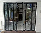 Slim Foldable Glass Doors with Black Frame